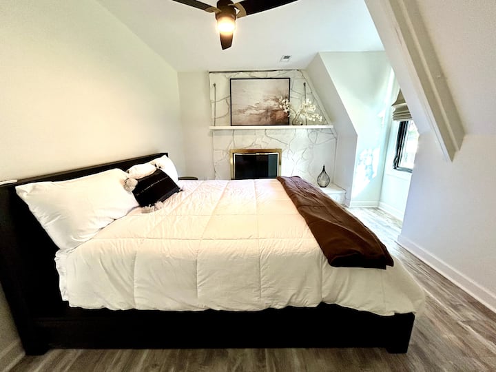 This bedroom has a king bed. The room also has a closet where you can store your luggage. 
