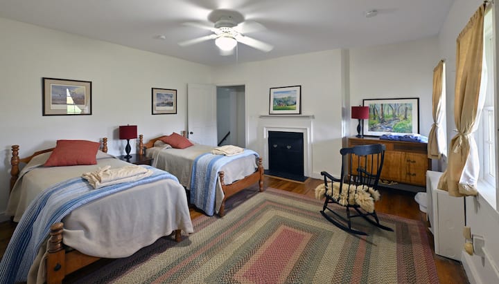 In the center of the home, with the 2 twin bed feature 2 closets, a roomy bureau, a rocker ~ well... what else?  Relax and sleep well.