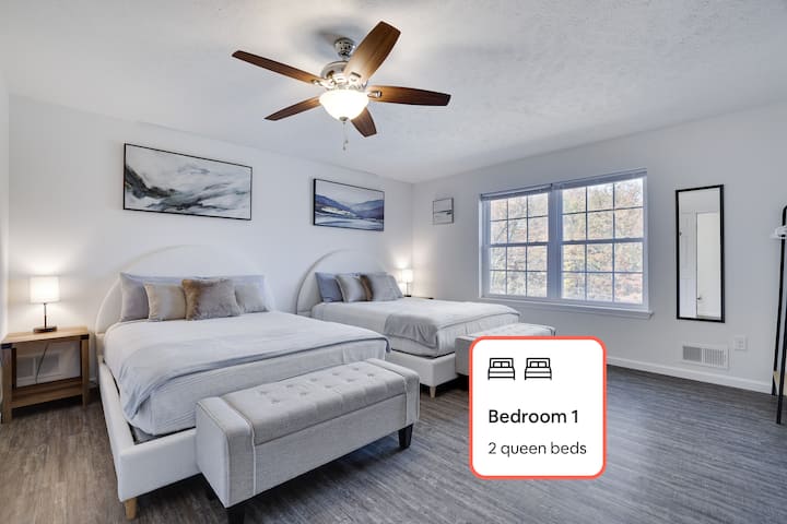 Bedroom No. 1 | 2 Queen Beds | 65" 4K UHD Roku TV | Ceiling Fan | Standing Wardrobes