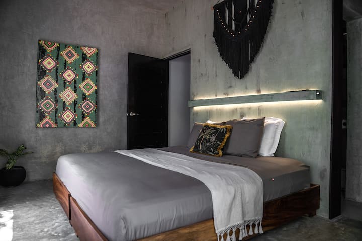 The Ferro suite with jungle views and ensuite bathroom.