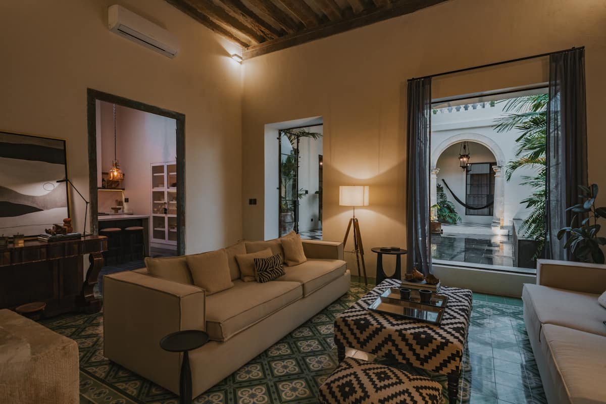 Casa Japa — 18th-century stone courtyard with moorish columns — Casonas MX, Campeche, Mexico