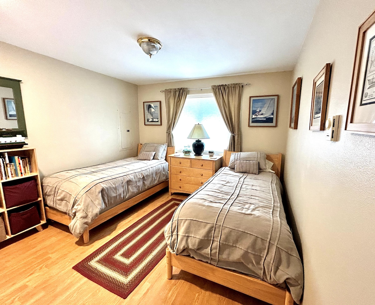 Second Bedroom has Two Twin Beds which can convert to a King Bed.  Portable crib and linens are also provided.  Plenty of toys, puzzles, games for younger children are provided in the room and in the closet. 