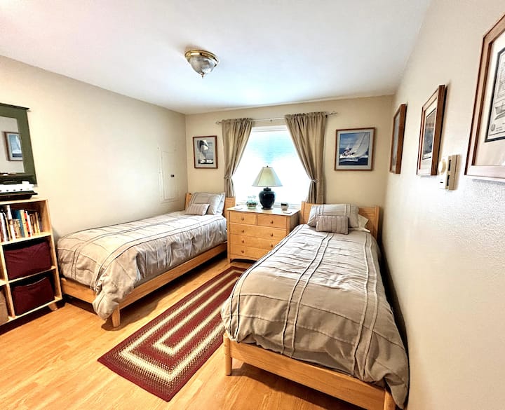 Second Bedroom has Two Twin Beds which can convert to a King Bed.  Portable crib and linens are also provided.  Plenty of toys, puzzles, games for younger children are provided in the room and in the closet. 