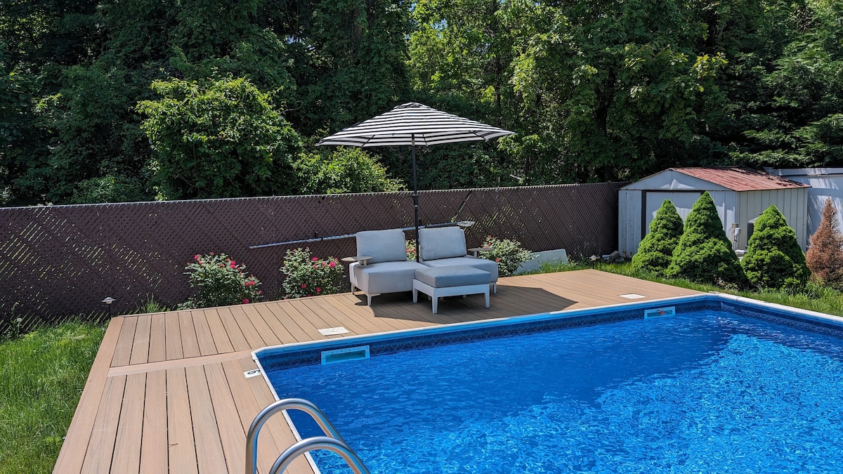 Poolside deck with lounge chairs