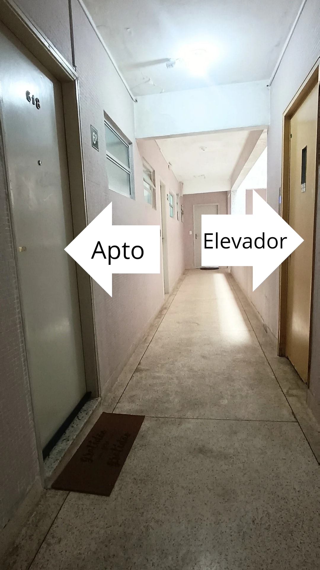 A well-lit corridor features a light-colored floor and walls, with doors to apartments lining both sides. A door marked '616' is visible on the left, and an elevator door is indicated on the right, providing clear access to the building's amenities.