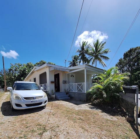 4 mins drive to beach Rental car available