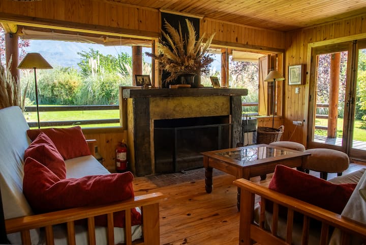 Cozy wooden cabin with mountain views