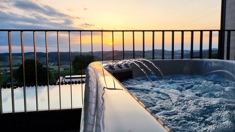 Lodge with a private hot tub