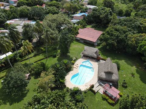 Swimming pool, hammocks, games, nature, and relaxation