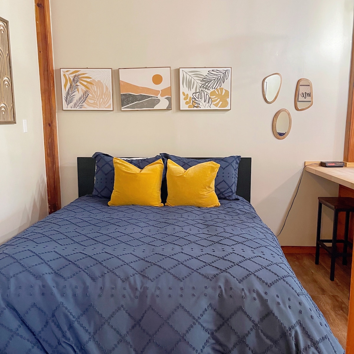 Sink into this peaceful queen bed dressed in soft linens and warm tones — the perfect place to rest after a day of springs, music, or simply doing nothing at all. A cozy, quiet space built for connection and comfort.