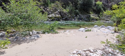 Riverside cottage. Private beach. Swimming.