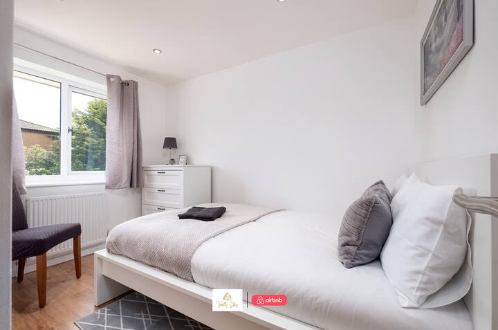 غرفة نوم في إقامات ترينيتي إقامة قصيرة وأماكن إقامة مزودة بالخدمات