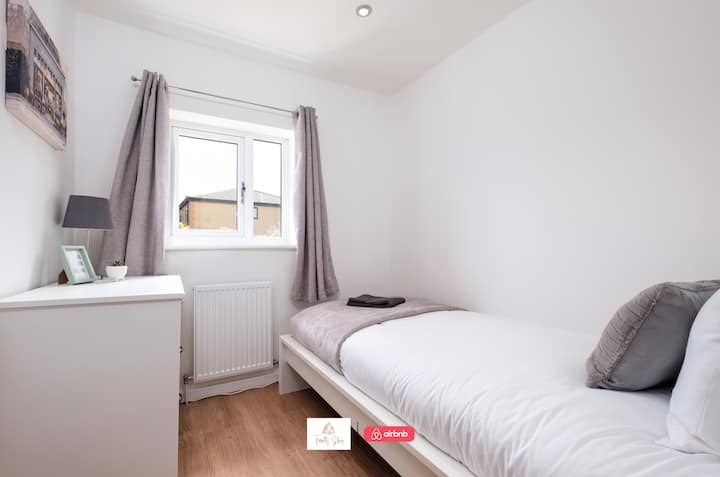 غرفة نوم في إقامات ترينيتي إقامة قصيرة وأماكن إقامة مزودة بالخدمات