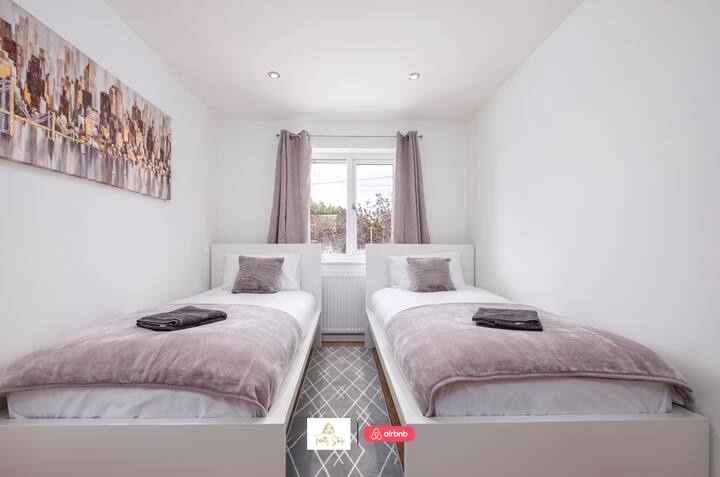 غرفة نوم في إقامات ترينيتي إقامة قصيرة وأماكن إقامة مزودة بالخدمات