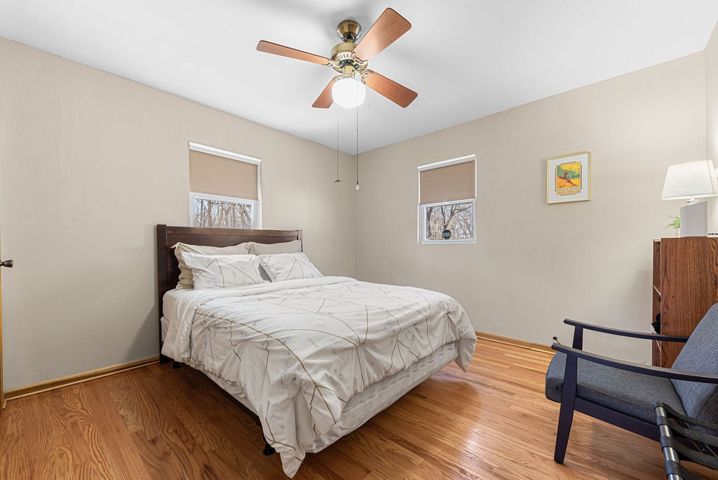 All bedrooms have a chair, ceiling fan, luggage rack, dresser, hangers, and an afghan in the bedroom closet. This room also has a bookcase with a table light, books for all ages, and stuffed animals. 