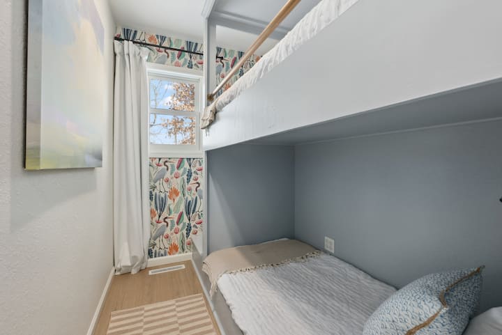Cozy area with Twin XL built in bunk & sliding door for privacy. Enough headroom for adults to full sit up and long enough for adults.