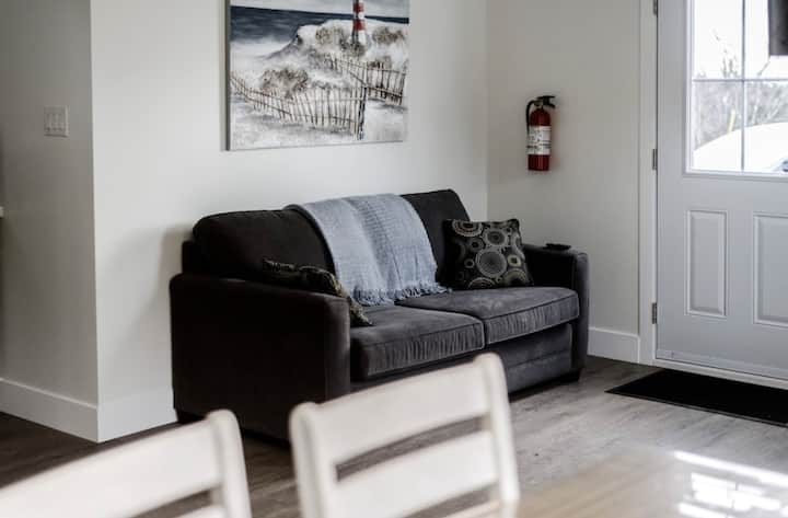 Bottom floor by entrance.  Double sofa bed. 