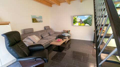 Top Airbnb: High-quality, quiet apartment with a great garden oasis in Wittmund