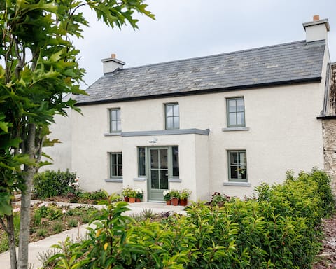 Authentically restored contemporary farmhouse