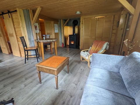 Popular Airbnb listing: Aurora Hilltop Retreat quiet forest home w hot tub in College