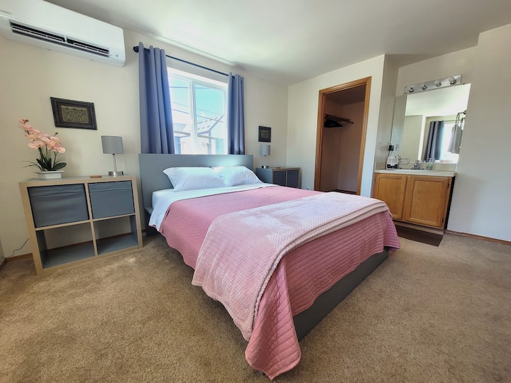 Roomy Queen with lucid memory foam mattress, workspace and walk in closet with sink and lighted vanity in room. wifi. Kitchen, laundry, 2 bath and greenspaces shared 