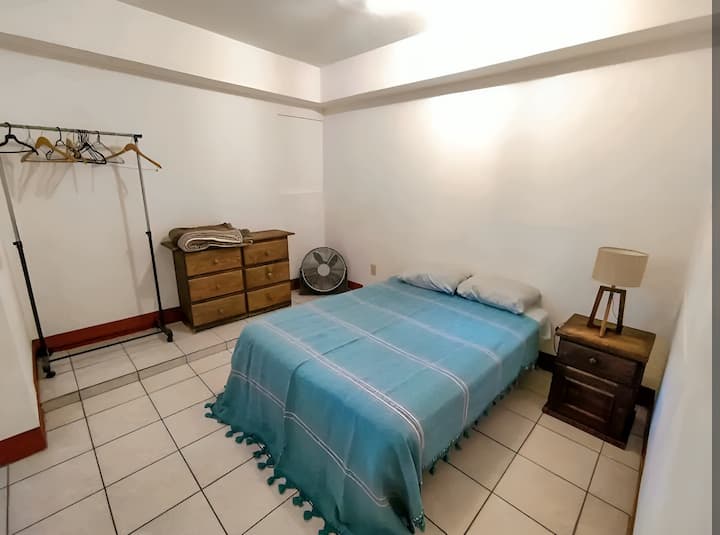 The bedroom 3 is located on the ground floor so you have to go down stairs, this is a more private space with private bathroom, next to the living room