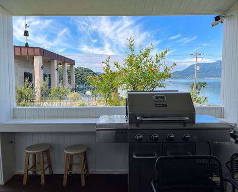 Beach House - A Place with Outdoor Hot Tub and BBQ