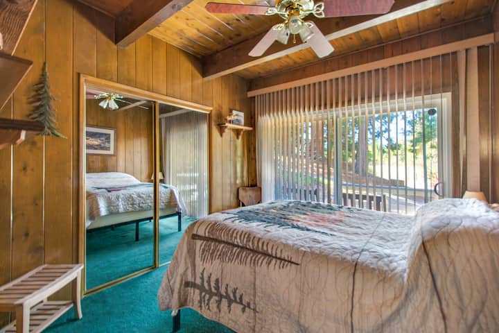 Downstairs bedroom with a private deck! Perfect when vacationing with couples who want privacy or seniors who don't want to use stairs. Bed is full size! Pack and Play available for babies. 