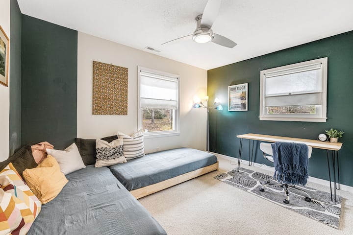 Our third bedroom offers two twin beds that can be pushed together to form a King or use them as a lounging daybed! Working while away? This room offers a large desk and comfy rolling chair.