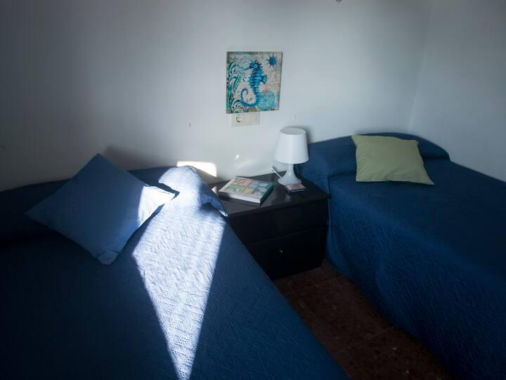 Habitación con dos camas de 90