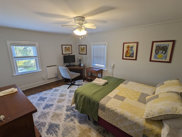 Upstairs Bedroom - full size bed, -desk/vanity, dresser, closet, "Bring Your Own Computer" station (USB C docking monitor, webcam, keyboard, speakers)