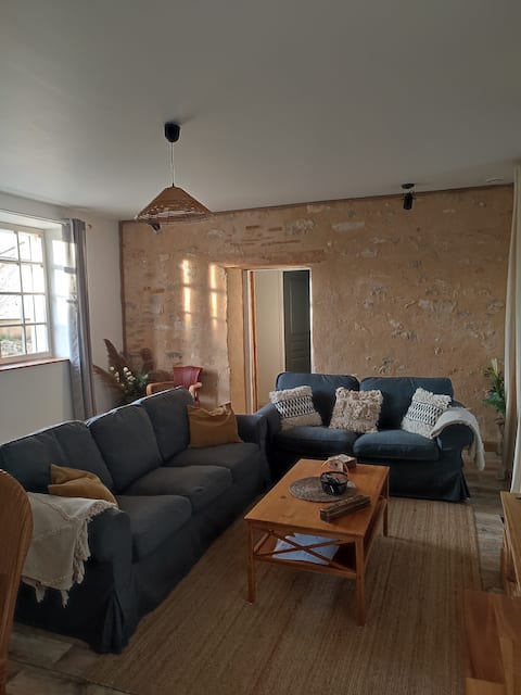 Stone house with garden and large parking lot