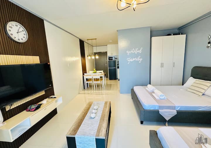 Experience luxury condo living in Puerto Princesa! It features modern décor, a smart TV, AC, and stylish elegant lighting. Perfect for staycations and long-term stays, it is in a prime location near attractions. Book your dream stay now!