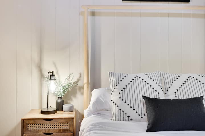 Comfortable bedding and sound machine. 