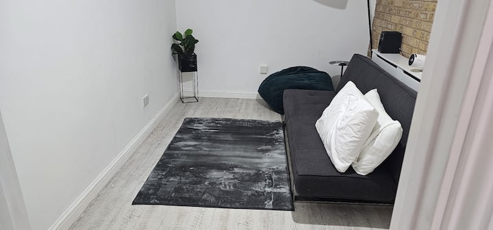 This Cinema room doubles as a fifth bedroom on the ground floor with step-free access. 
The sofa opens out easily into a bed and pillows along with linens and blanket are provided 