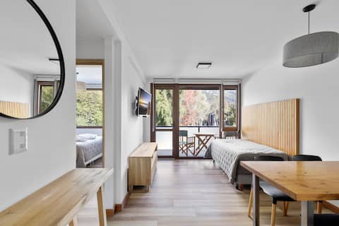 Apartment with a view of Cerro Otto and a grill.