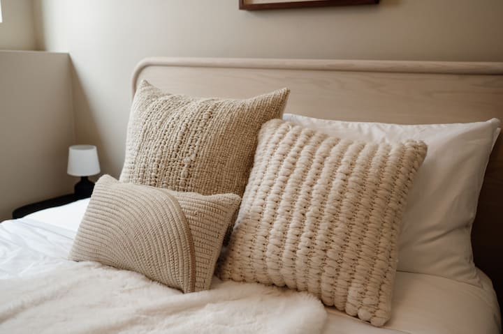 Nestled in comfort, where dreams find their soft embrace.