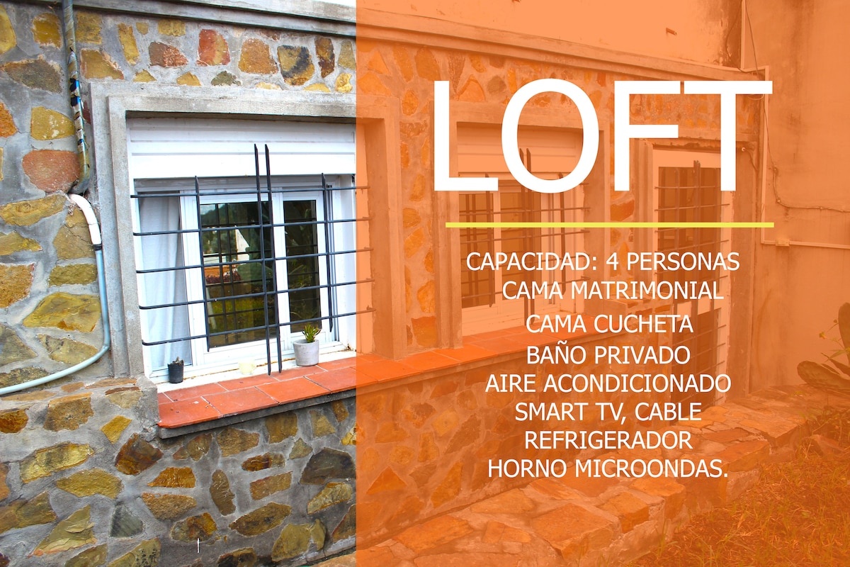 A stone exterior is highlighted, featuring a window with a secure grille. The text indicates the loft's capacity and amenities, emphasizing a double bed and a bunk bed. Natural light is visible through the window, providing an inviting ambiance.
