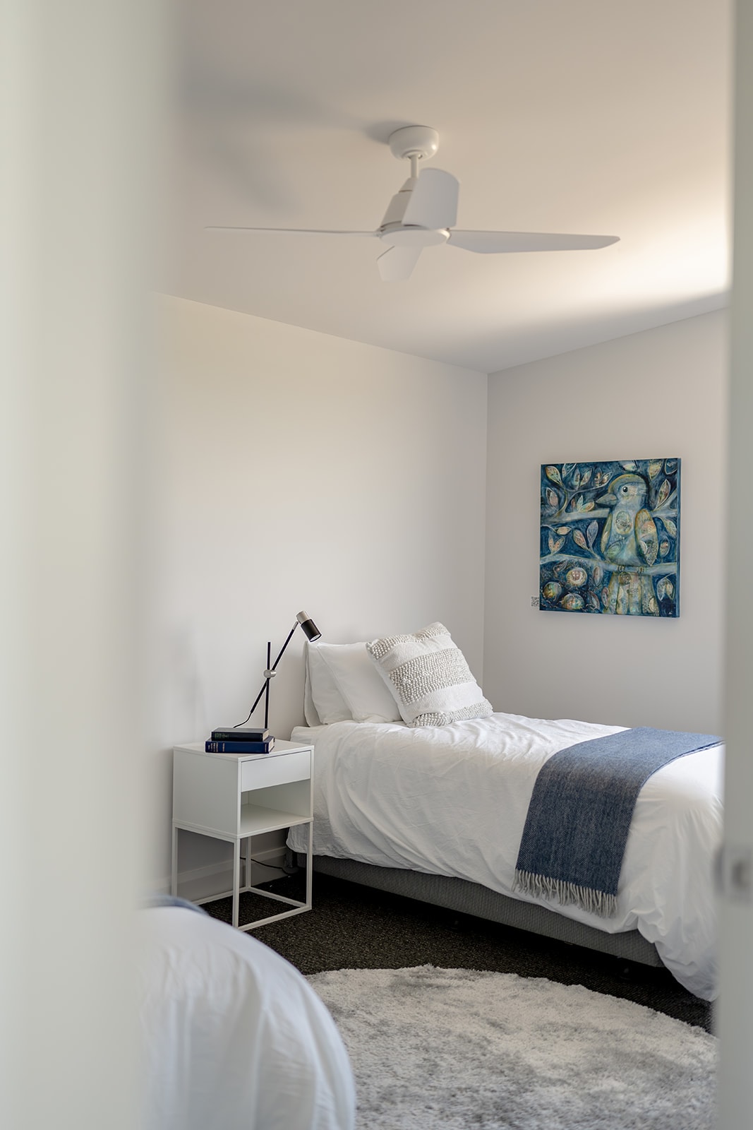 Two single beds with trundles that can convert to king size beds.