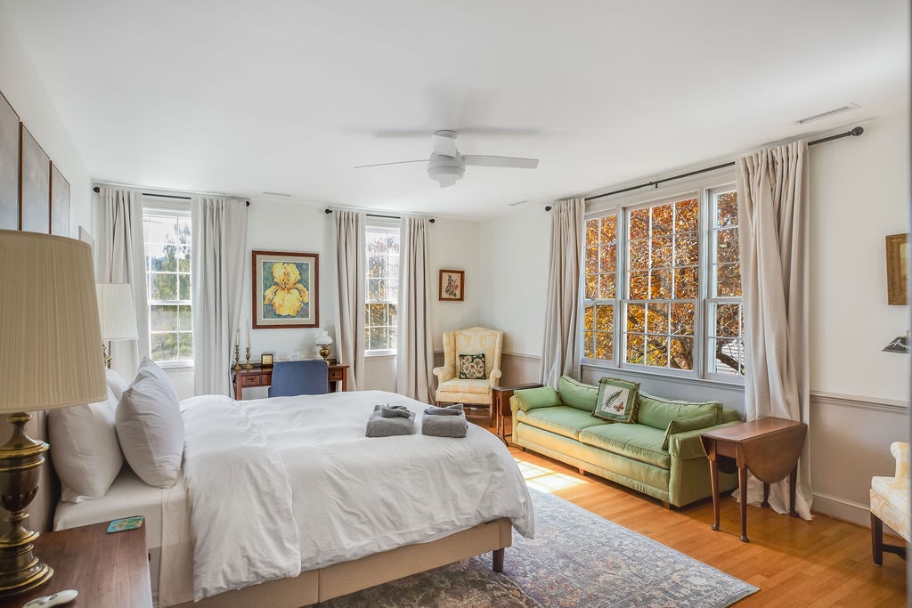 In the Farmhouse: The Master Suite is spacious with two large closets, blackout curtains, and an en suite bathroom. 