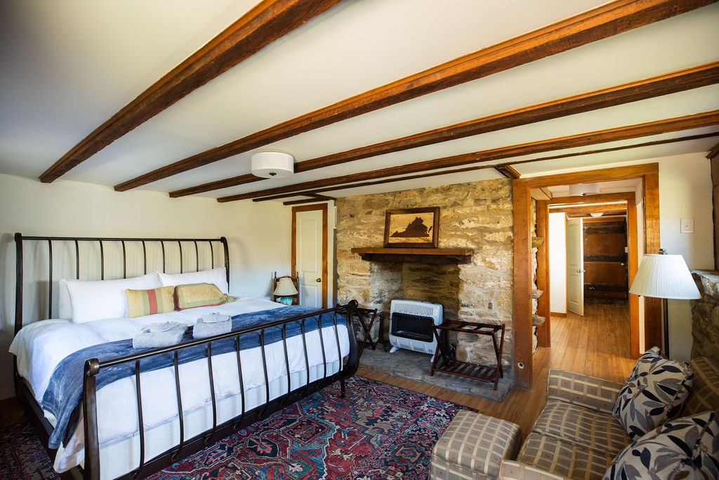 In the Cottage (available to rent for an additional fee): The beautiful king bedroom on the lower level of the Cottage has a new mattress and plenty of private space.