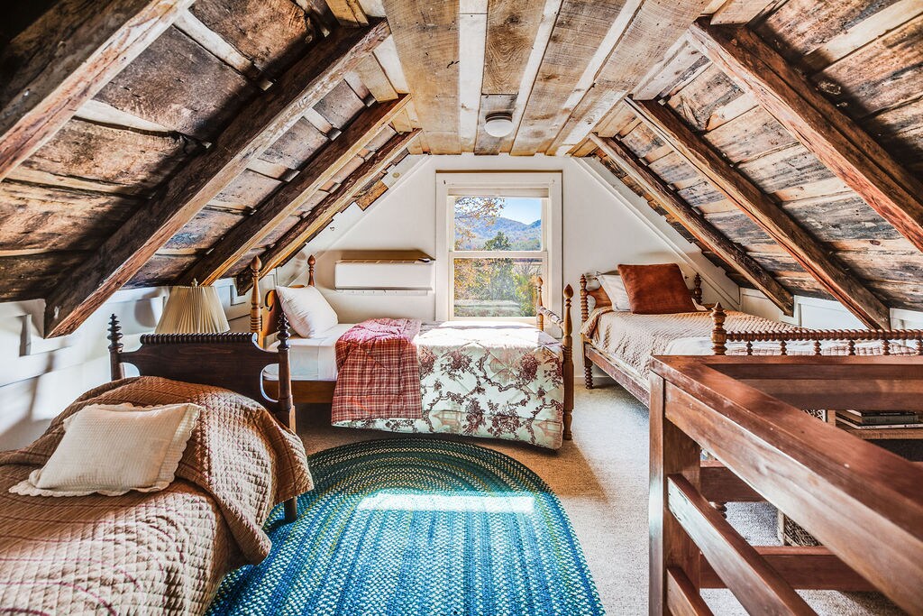 In the Cottage (available to rent for an additional fee): This loft bedroom above Bedroom 8 includes three additional single beds. 