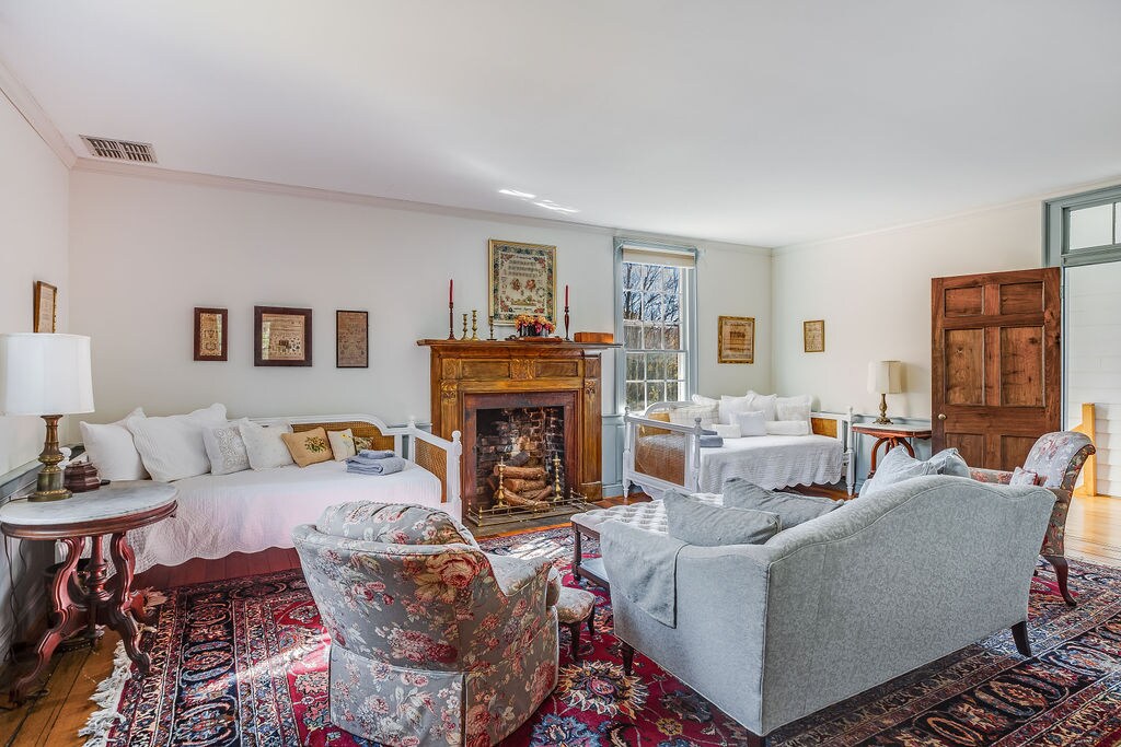 In the Farmhouse: The Parlor is a beautiful spot to relax or sleep.