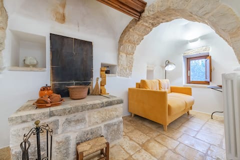 Top performing Airbnb: Trullo 2 bedrooms - Heated Pool - Portico in Cisternino