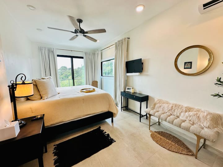 The Rum Room suite. main floor behind the kitchen. En-suite bathroom, walkout patio to the pool.