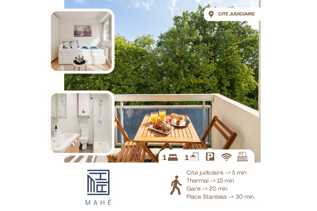 A bright balcony features a wooden table set for breakfast with glasses and pastries. Lush green trees provide a natural backdrop, while sunlight filters through. Inside, a cozy seating area with soft furnishings is visible, enhancing the overall inviting environment.