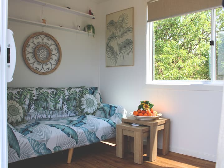 Futon fold down sofa turns into double bed. Linens and towels provided for extra guests.