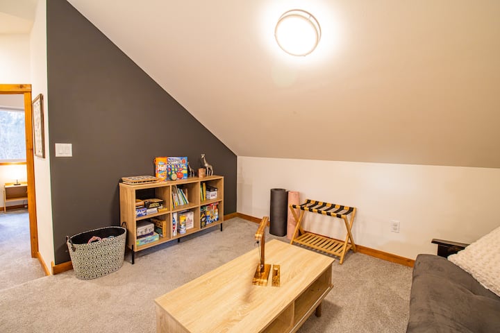 The loft is left open for the kids to have room to play. Enjoy the provided board games, card games, puzzles, books and children's toys.
