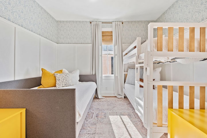 Third bedroom with queen daybed and twin bunk bed. The closet also contains two twin foam sleeping pads.