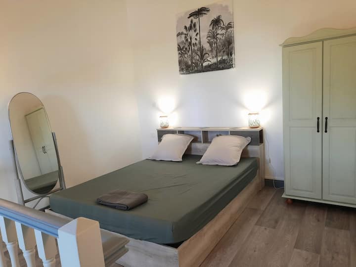 The bedroom on the mezzanine.